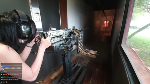 Jinnytty firing a M73 machine gun (50 Cal)