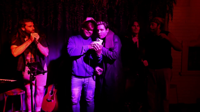Nick and the Boys having a moment together