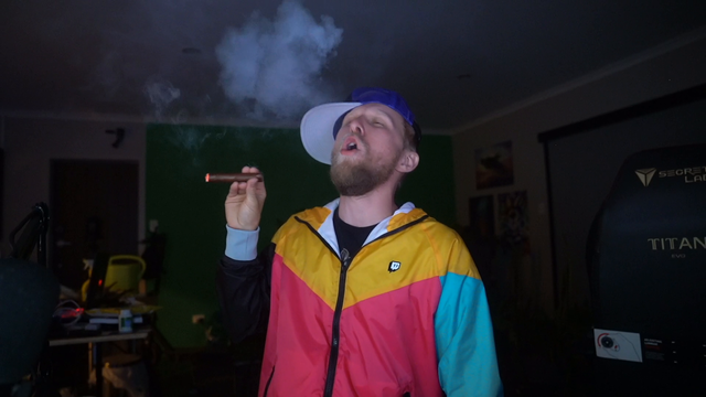 Bozo69 fully inhaling a cigar