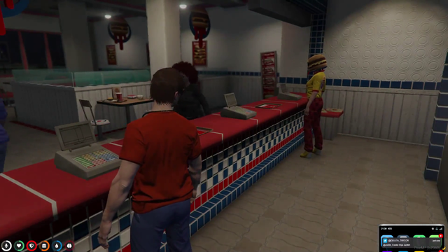 Kevin Whipaloo has a conversation with his employees