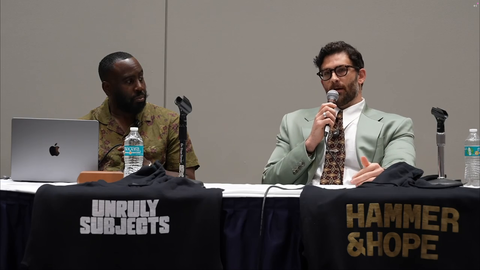 Hasan says he "got shot at by the police"