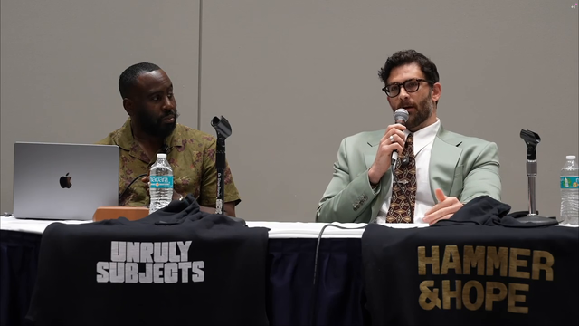 Hasan says he "got shot at by the police"