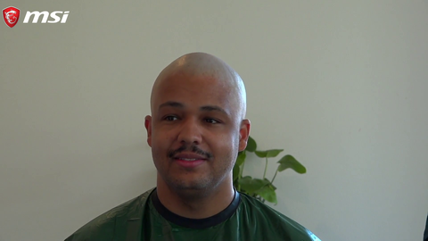 Nick shaves his head for charity