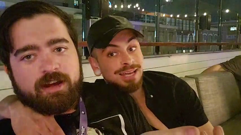 Twitch streamer goes ballistic when random guy starts cuddling and biting him at a bar.