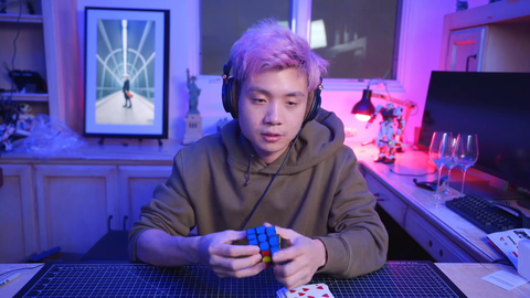 "$100 if you solve the Rubik's Cube in less than 20 seconds"