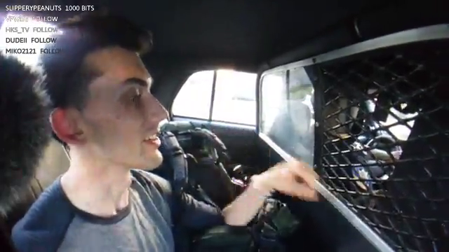 Hitchhiker live streams from the back of a police car!