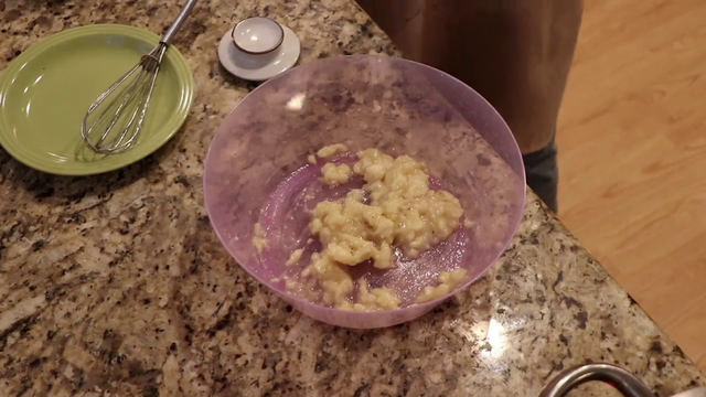 Henry tries his best to add sugar to his bananas (with help from Alexa)