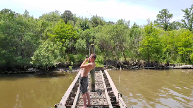 Alec gets smacked in the head by a fishing rod
