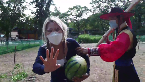 Yuggie tries to steal a watermelon
