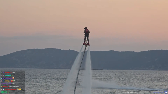 Jinny flies on a water jetpack