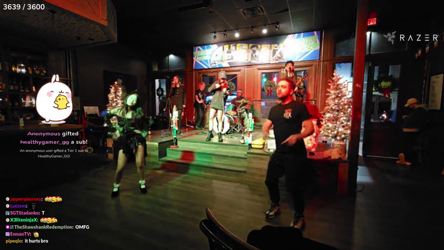 Mizkif and ExtraEmily "dance" at an Austin Bar
