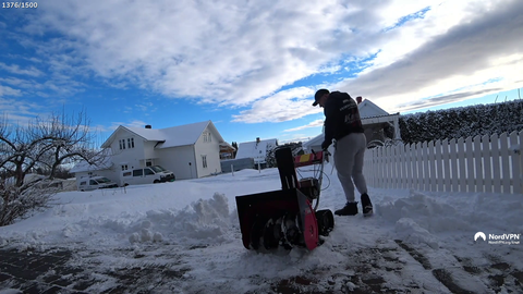 Knut starting his snowblower.