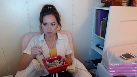 Maya eats some of her cereal and then breathes.