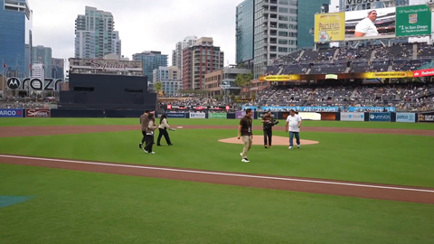 Emiru throws the first pitch at the Padres vs Dodgers game