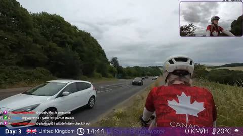 SarahBridgewater wipes out going downhill on her bike and lands in a thorny bush