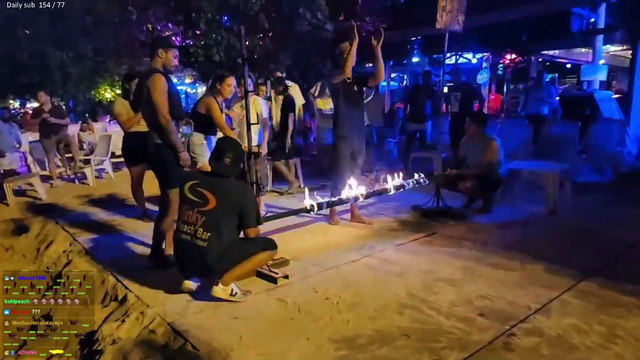 one-foot-tall flaming limbo