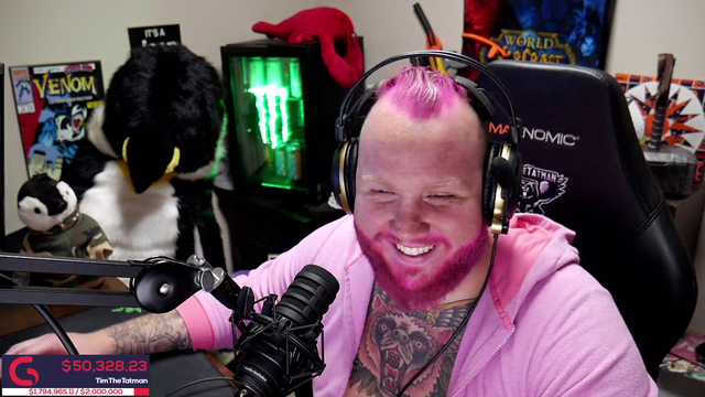 Tim becomes a Unicorn after raising 50K for Charity (dyes hair and beard pink)