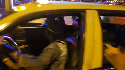 Hampton Brandon hops into the back of a taxi when the driver is looking elsewhere.