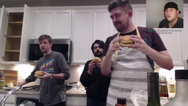 The boys take a bite of Roflgator's burgers