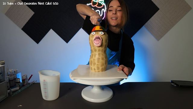 cakesbyyou finishes her TheBurntPeanut cake after 6 hours (complete with working chocolate propeller cap)