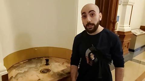 Sliker drinks antique water