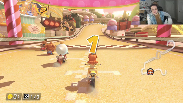 Erobb finally gets to 1st place in Mario Kart