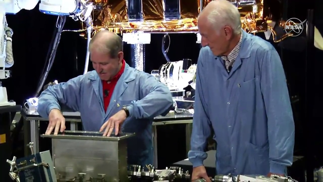 NASA scientists carefully disassembling a $20B telescope live