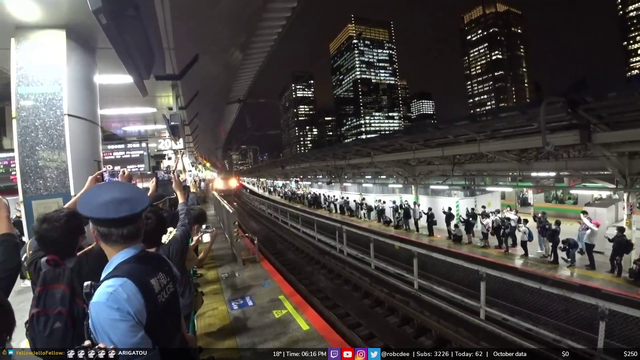 Japanese people saying final farewell to a train
