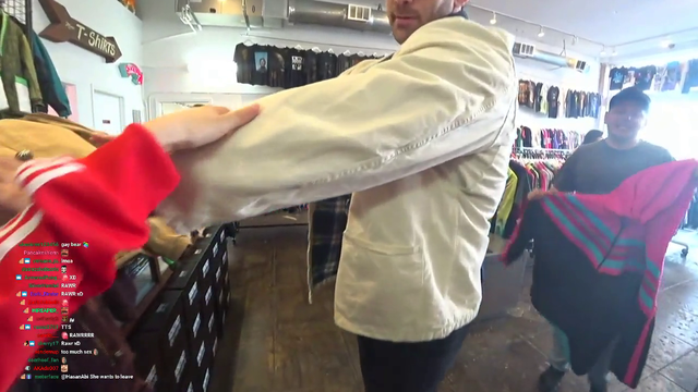 Store employee shows HAchubby a jacket.