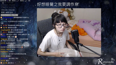 Female IRL streamer holds cat in a bag during stream