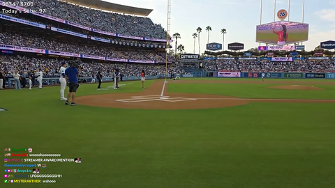 Emily throws the first pitch at the LA Dodgers vs. KC Royals Baseball Game