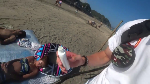 Jakenbake draws a penis tan line on a sleeping girl at the beach.