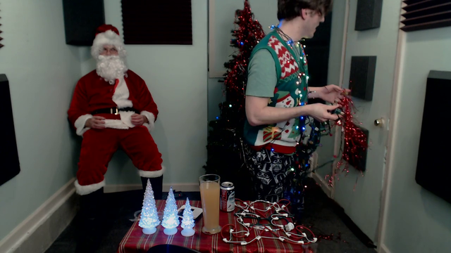Santa chugs Jerma's beer