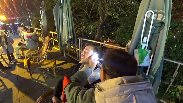 Ear cleaner finds something interesting in Jake's ear