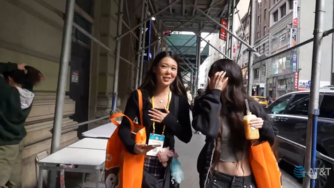 A guy falls in front of Emi and Emily