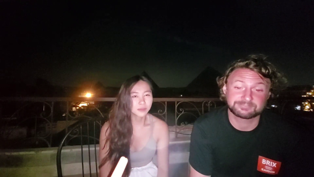 A streamer's Aware moment in front of the Pyramids of Giza