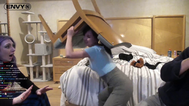 Technician showing Minx her mating dance.