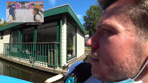 Jake gets a free beer on a canal