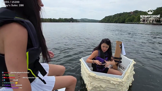 Emily's cardboard boat can handle 2 people while in the middle of the lake