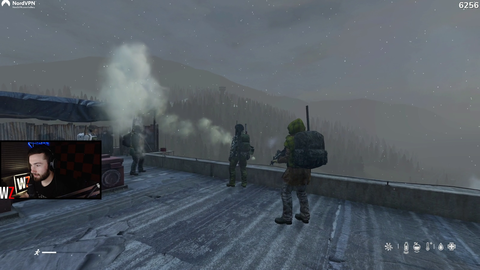 DayZ streamer and friends practice throwing nades off the roof