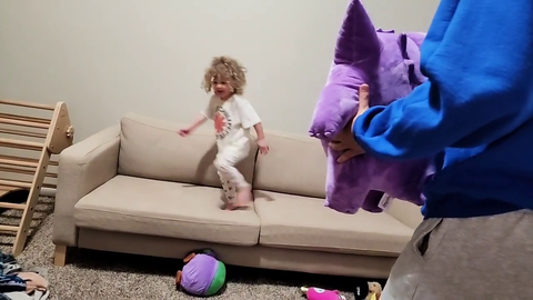 Erobb throws a plushie at Emmy.