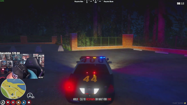 Summit finds a way to entertain himself in the back of a cop car...