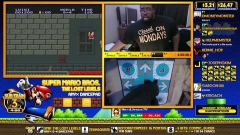 Big Jon beats Mario: the Lost Levels on a dancepad