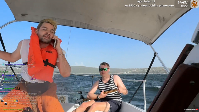 Cyr phoning 911. Boat sail broken in high winds