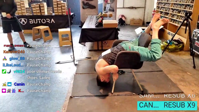 Man attempts to sit on chair