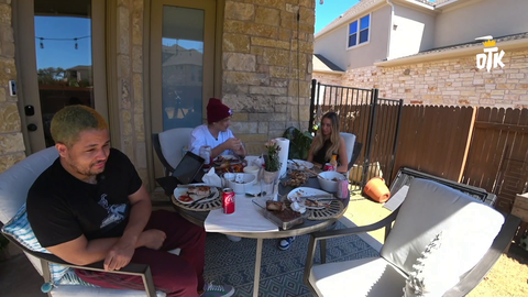 Mitch tells a story to his girlfriend