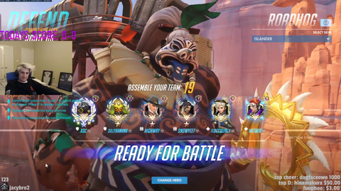 xqc runs into a girl on overwatch
