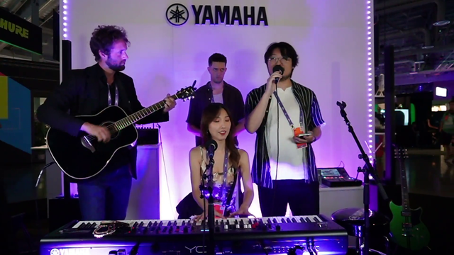 Jo sings country roads with an impromptu band