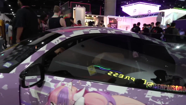 Big streamer gets stuck inside small car.