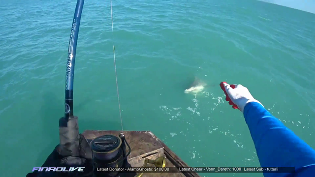Finao fighting a giant bull shark when his rod breaks